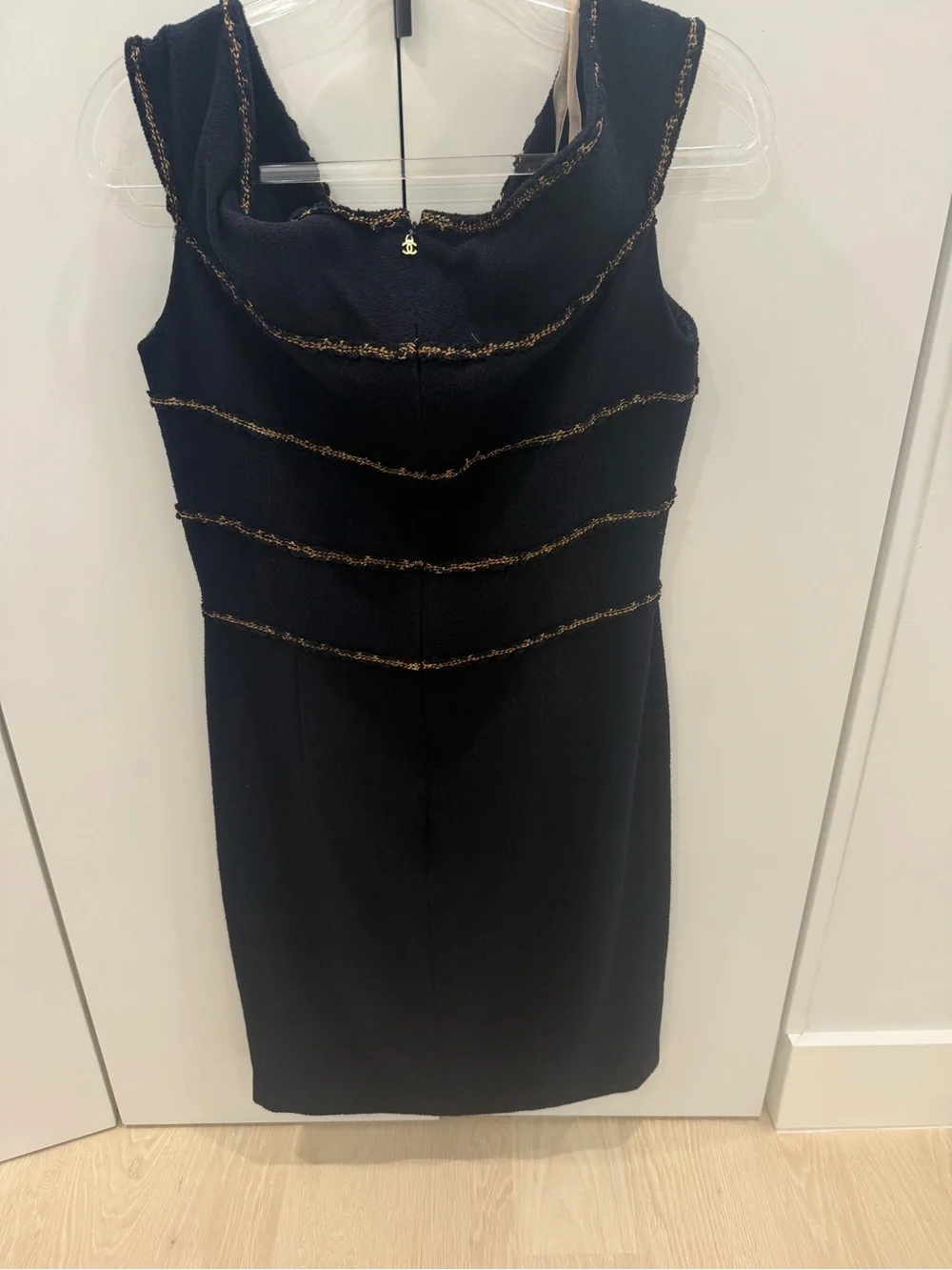 CHANEL Black Midi Dress with Gold Trim and Signature Charm